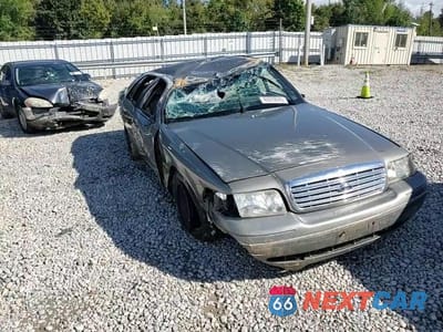 Zdjęcie 13 z 13 samochodu: 2000 FORD CROWN VICTORIA VIN:2FAFP73W6YX122170 - miniatura