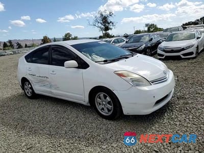 Zdjęcie 13 z 14 samochodu: 2004 TOYOTA PRIUS VIN:JTDKB20U340111133 - miniatura