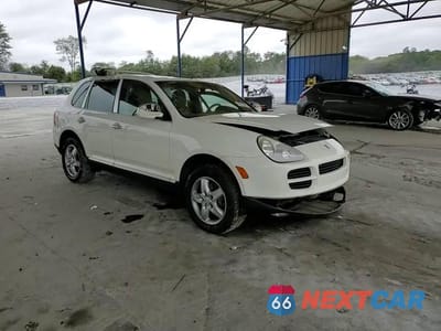 Zdjęcie 13 z 14 samochodu: 2004 PORSCHE CAYENNE VIN:WP1AA29P04LA21754 - miniatura