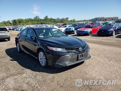 Zdjęcie 13 z 15 samochodu: 2018 TOYOTA CAMRY HYBRID VIN:4T1B21HK8JU503456 - miniatura