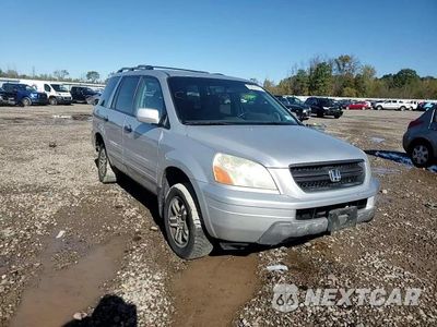 Zdjęcie 14 z 15 samochodu: 2004 HONDA PILOT EX VIN:2HKYF18474H551145 - miniatura