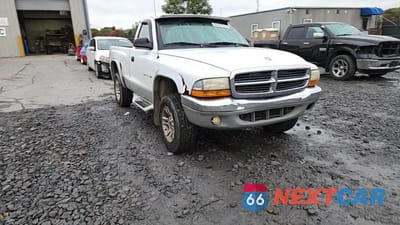Zdjęcie 13 z 14 samochodu: 2001 DODGE DAKOTA VIN:1B7GG26X31S234049 - miniatura