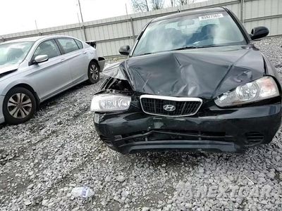 Zdjęcie 13 z 14 samochodu: 2002 HYUNDAI ELANTRA GLS VIN:KMHDN45D72U427687 - miniatura