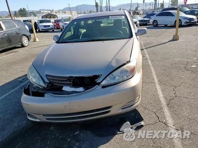 Zdjęcie 13 z 14 samochodu: 2002 TOYOTA CAMRY LE VIN:4T1BF32K22U539752 - miniatura