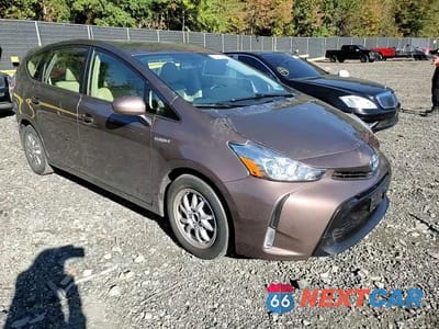 Zdjęcie 13 z 14 samochodu: 2016 TOYOTA PRIUS V VIN:JTDZN3EU0GJ047023 - miniatura