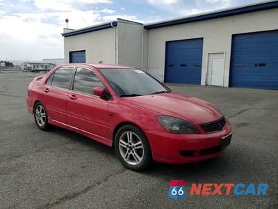 Zdjęcie 13 z 14 samochodu: 2006 MITSUBISHI LANCER RALLIART VIN:JA3AJ66F26U609994 - miniatura