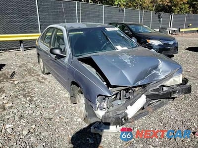 Zdjęcie 13 z 14 samochodu: 1999 NISSAN SENTRA BASE VIN:3N1AB41D9XL076033 - miniatura