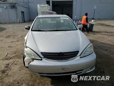 Zdjęcie 13 z 14 samochodu: 2004 TOYOTA CAMRY LE VIN:4T1BF30K84U579971 - miniatura