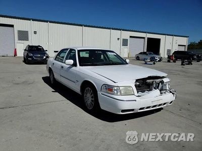 Zdjęcie 13 z 14 samochodu: 2010 MERCURY GRAND MARQUIS LS VIN:2MEBM7FV2AX624943 - miniatura