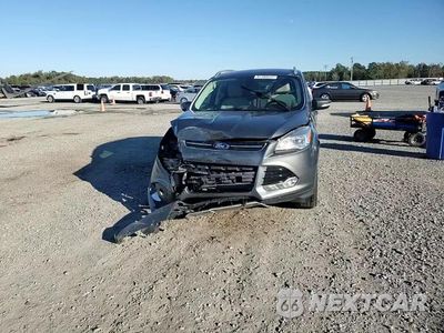 Zdjęcie 14 z 15 samochodu: 2014 FORD ESCAPE TITANIUM VIN:1FMCU0JX5EUA50661 - miniatura