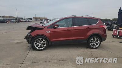 Zdjęcie 13 z 14 samochodu: 2015 FORD ESCAPE TITANIUM VIN:1FMCU0J92FUC04052 - miniatura