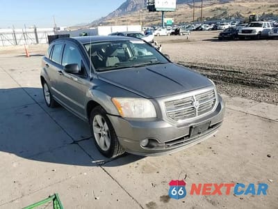 Zdjęcie 14 z 15 samochodu: 2011 DODGE CALIBER MAINSTREET VIN:1B3CB3HA3BD254563 - miniatura