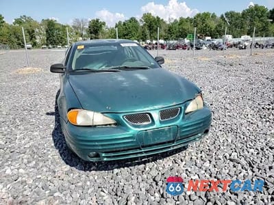 Zdjęcie 13 z 13 samochodu: 1999 PONTIAC GRAND AM SE VIN:1G2NE52T0XM701933 - miniatura