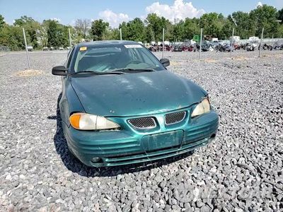 Zdjęcie 13 z 13 samochodu: 1999 PONTIAC GRAND AM SE VIN:1G2NE52T0XM701933 - miniatura
