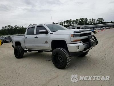 Zdjęcie 14 z 16 samochodu: 2017 CHEVROLET SILVERADO K1500 LT VIN:3GCUKREC4HG106199 - miniatura