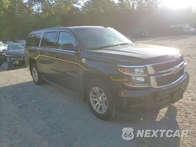 Zdjęcie 14 z 15 samochodu: 2019 CHEVROLET SUBURBAN K1500 LT VIN:1GNSKHKCXKR112142 - miniatura