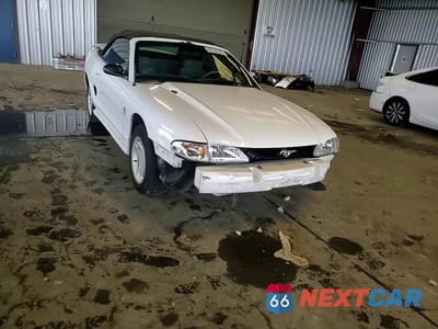 Zdjęcie 14 z 15 samochodu: 1996 FORD MUSTANG VIN:1FALP4443TF233780 - miniatura