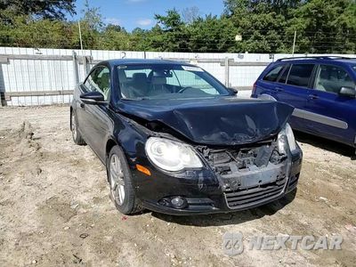 Zdjęcie 13 z 14 samochodu: 2010 VOLKSWAGEN EOS LUX VIN:WVWFA7AH0AV014358 - miniatura