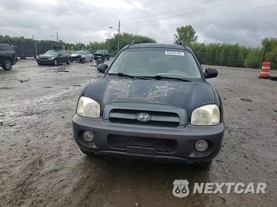 Zdjęcie 14 z 15 samochodu: 2005 HYUNDAI SANTA FE GLS VIN:KM8SC73E55U872430 - miniatura