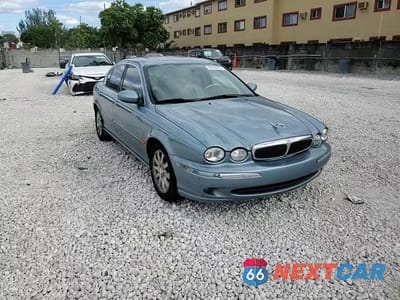 Zdjęcie 14 z 15 samochodu: 2003 JAGUAR X-TYPE 2.5 VIN:SAJEA51D63XD37662 - miniatura