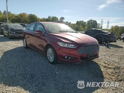 Zdjęcie 13 z 14 samochodu: 2014 FORD FUSION TITANIUM PHEV VIN:3FA6P0SU5ER234170 - miniatura