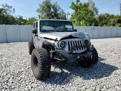 Zdjęcie 14 z 14 samochodu: 2015 JEEP WRANGLER UNLIMITED SPORT VIN:1C4BJWDG7FL690062 - miniatura