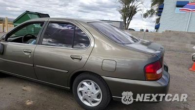 Zdjęcie 13 z 14 samochodu: 1999 NISSAN ALTIMA XE VIN:1N4DL01D9XC164422 - miniatura