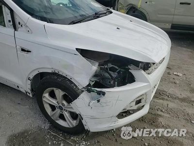 Zdjęcie 15 z 16 samochodu: 2015 FORD ESCAPE SE VIN:1FMCU0G77FUA11871 - miniatura