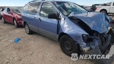 Zdjęcie 14 z 15 samochodu: 2003 TOYOTA SIENNA CE VIN:4T3ZF19C93U527432 - miniatura
