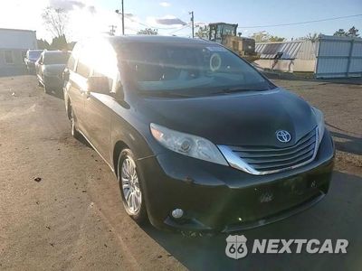 Zdjęcie 14 z 15 samochodu: 2014 TOYOTA SIENNA XLE VIN:5TDYK3DC7ES493229 - miniatura
