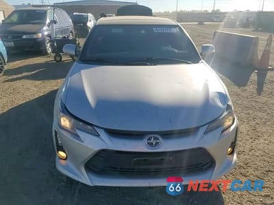 Zdjęcie 13 z 14 samochodu: 2014 TOYOTA SCION TC VIN:JTKJF5C71E3086443 - miniatura