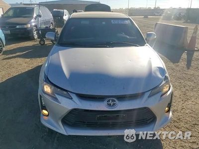 Zdjęcie 13 z 14 samochodu: 2014 TOYOTA SCION TC VIN:JTKJF5C71E3086443 - miniatura