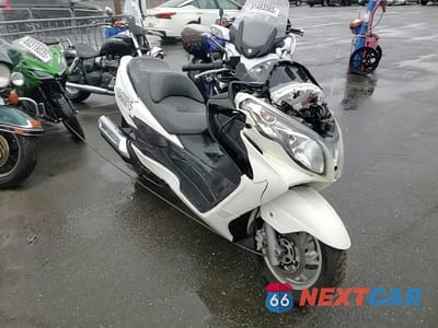 Zdjęcie 10 z 10 samochodu: 2011 SUZUKI AN400 A VIN:JS1CK44B7B2100818 - miniatura