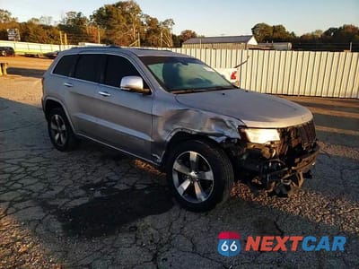 Zdjęcie 14 z 15 samochodu: 2015 JEEP GRAND CHEROKEE OVERLAND VIN:1C4RJECT4FC734753 - miniatura
