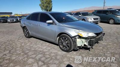Zdjęcie 14 z 15 samochodu: 2015 TOYOTA CAMRY HYBRID VIN:4T1BD1FK6FU145620 - miniatura