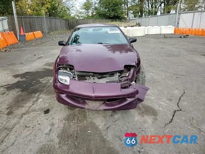 Zdjęcie 13 z 14 samochodu: 1996 PONTIAC SUNFIRE SE VIN:1G2JB1241T7541420 - miniatura