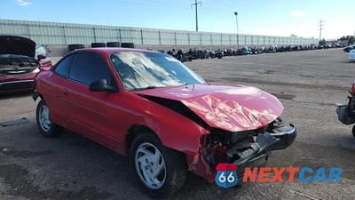 Zdjęcie 13 z 14 samochodu: 2002 FORD ESCORT ZX2 VIN:3FAFP11352R226533 - miniatura