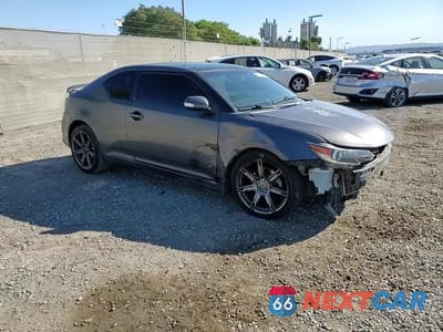 Zdjęcie 13 z 14 samochodu: 2015 TOYOTA SCION TC VIN:JTKJF5C71FJ002991 - miniatura