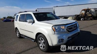 Zdjęcie 14 z 15 samochodu: 2011 HONDA PILOT TOURING VIN:5FNYF4H93BB086825 - miniatura