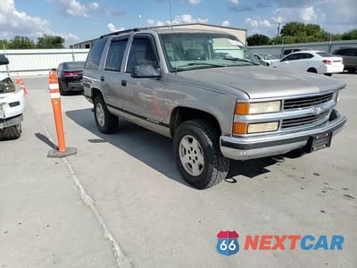 Zdjęcie 13 z 14 samochodu: 1999 CHEVROLET TAHOE VIN:1GNEK13R5XR149467 - miniatura