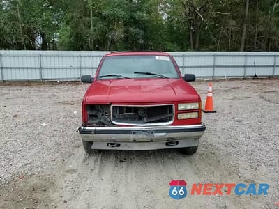 Zdjęcie 13 z 14 samochodu: 1998 GMC YUKON VIN:1GKEK13R5WJ723740 - miniatura