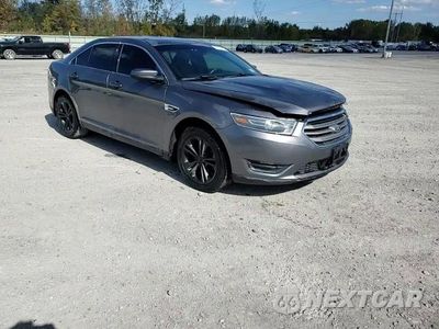 Zdjęcie 14 z 15 samochodu: 2014 FORD TAURUS SEL VIN:1FAHP2E83EG162914 - miniatura
