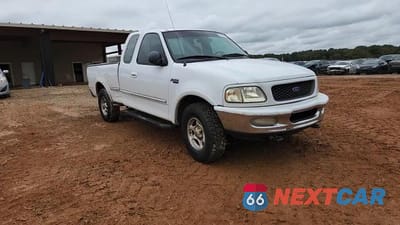 Zdjęcie 14 z 14 samochodu: 1997 FORD F150 VIN:1FTDX18WXVNC57320 - miniatura