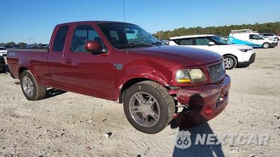 Zdjęcie 13 z 14 samochodu: 2003 FORD F150 VIN:2FTRX17W03CA46458 - miniatura