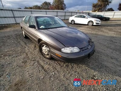 Zdjęcie 11 z 14 samochodu: 1995 CHEVROLET LUMINA VIN:2G1WL52M2S1196974 - miniatura