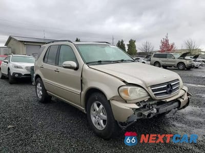 Zdjęcie 12 z 14 samochodu: 2005 MERCEDES-BENZ ML 500 VIN:4JGAB75E95A539368 - miniatura