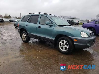 Zdjęcie 12 z 15 samochodu: 2001 HYUNDAI SANTA FE GLS VIN:KM8SC83D11U103866 - miniatura