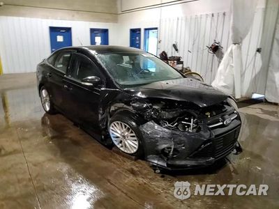 Zdjęcie 13 z 14 samochodu: 2014 FORD FOCUS TITANIUM VIN:1FADP3J24EL165026 - miniatura
