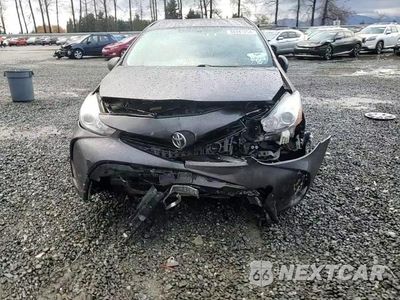 Zdjęcie 11 z 16 samochodu: 2015 TOYOTA PRIUS V VIN:JTDZN3EU7FJ027561 - miniatura