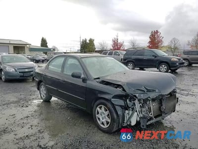 Zdjęcie 11 z 14 samochodu: 2002 KIA SPECTRA BASE VIN:KNAFB121225171948 - miniatura